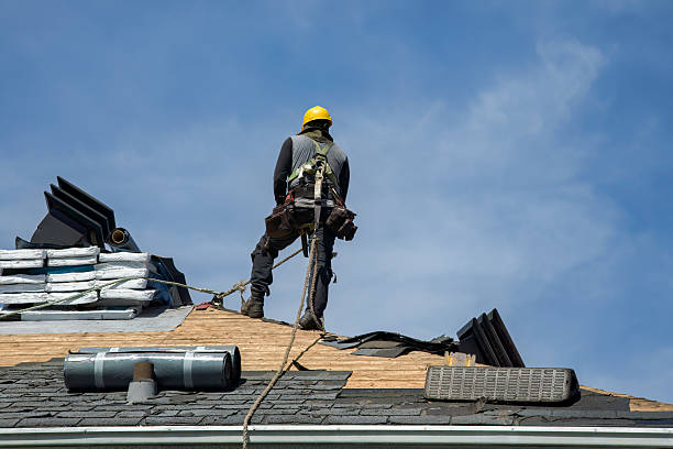 Professional Roof Replacement technician working in Cato, NY